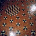 Chambre du rez-de-chaussée (B) : pavement.