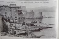 Vue du port de la Ponche avec sa cale de halage au centre et la Tour Vieille en arrire-plan, au dbut du 20e sicle.