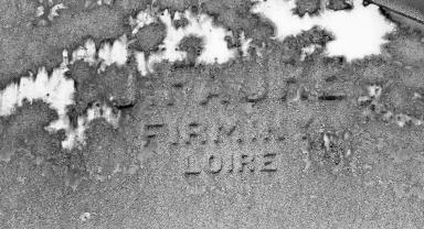 Inscription gravée sur le pignon du garage de l'Office National des Forêts, situé à l'entrée du hameau.