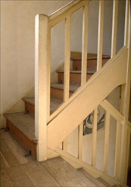 La rampe de l'escalier entre le rez-de-chausse et l'tage. Dtail.