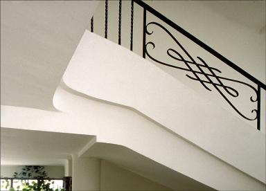 Détail : volée haute et rampe de l'escalier.