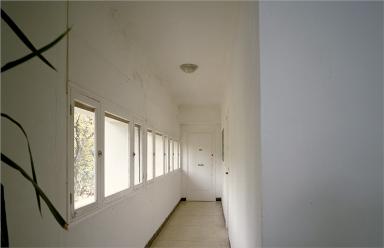 Coursière donnant accés aux appartements du premier étage, depuis l'escalier.